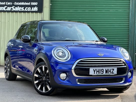 A 2019 MINI MINI COOPER EXCLUSIVE