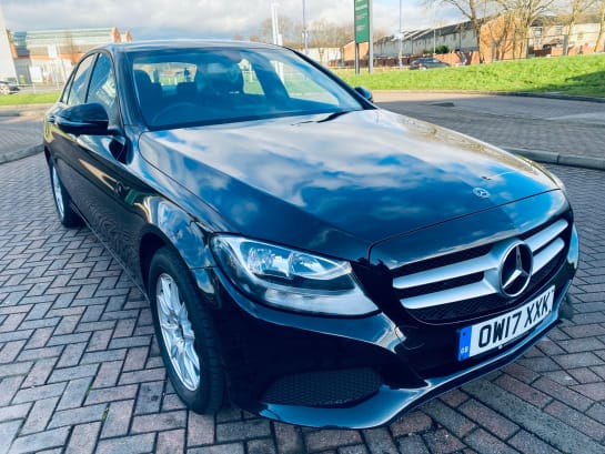 A 2017 MERCEDES C CLASS C300 H SE