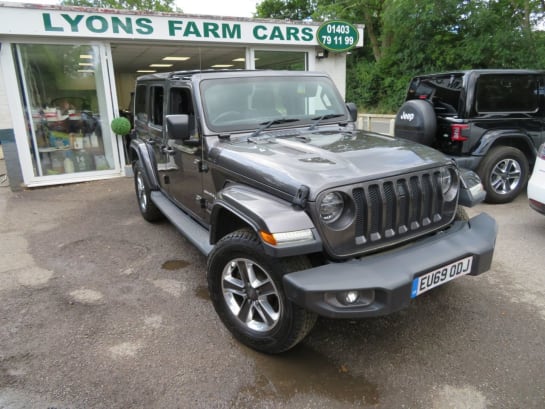 A 2019 JEEP WRANGLER SAHARA UNLIMITED