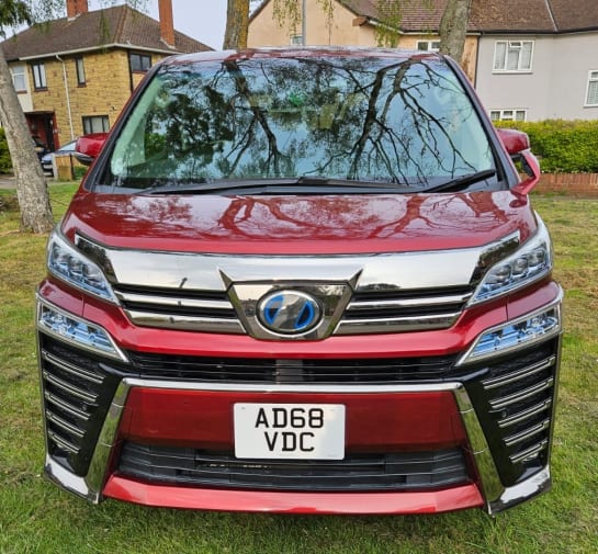 A null TOYOTA VELLFIRE 2.5L HYBRID EDITION-UNIQUE RED COLOR-ULEZ/CAZ PASS-FREE 48MONTHS GOLD WARRANTY INCLUDED.