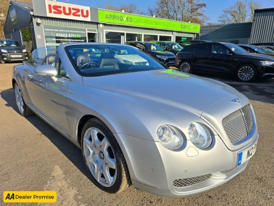 A null BENTLEY CONTINENTAL 6.0 GTC 2d 550 BHP IN SILVER WITH 68,549 MILES AND A FULL BENTLEY SERVICE H