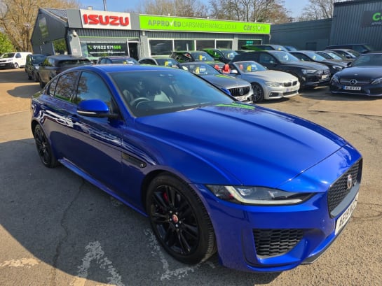 A null JAGUAR XE 2.0 P250i R-DYNAMIC SE SALOON IN BLUE WITH 84,500 MILES AND A FULL SERVICE